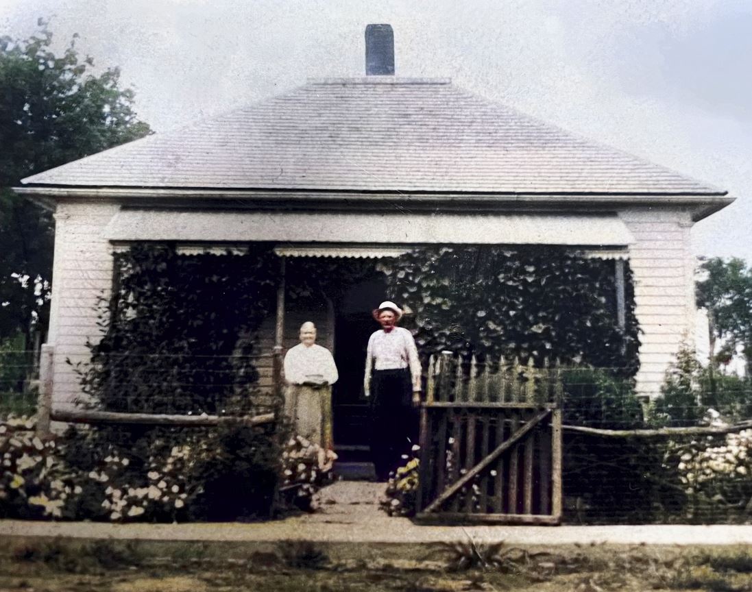 Margret Catherine Dill and Aquilla D. Anderson on porch in Kansas.